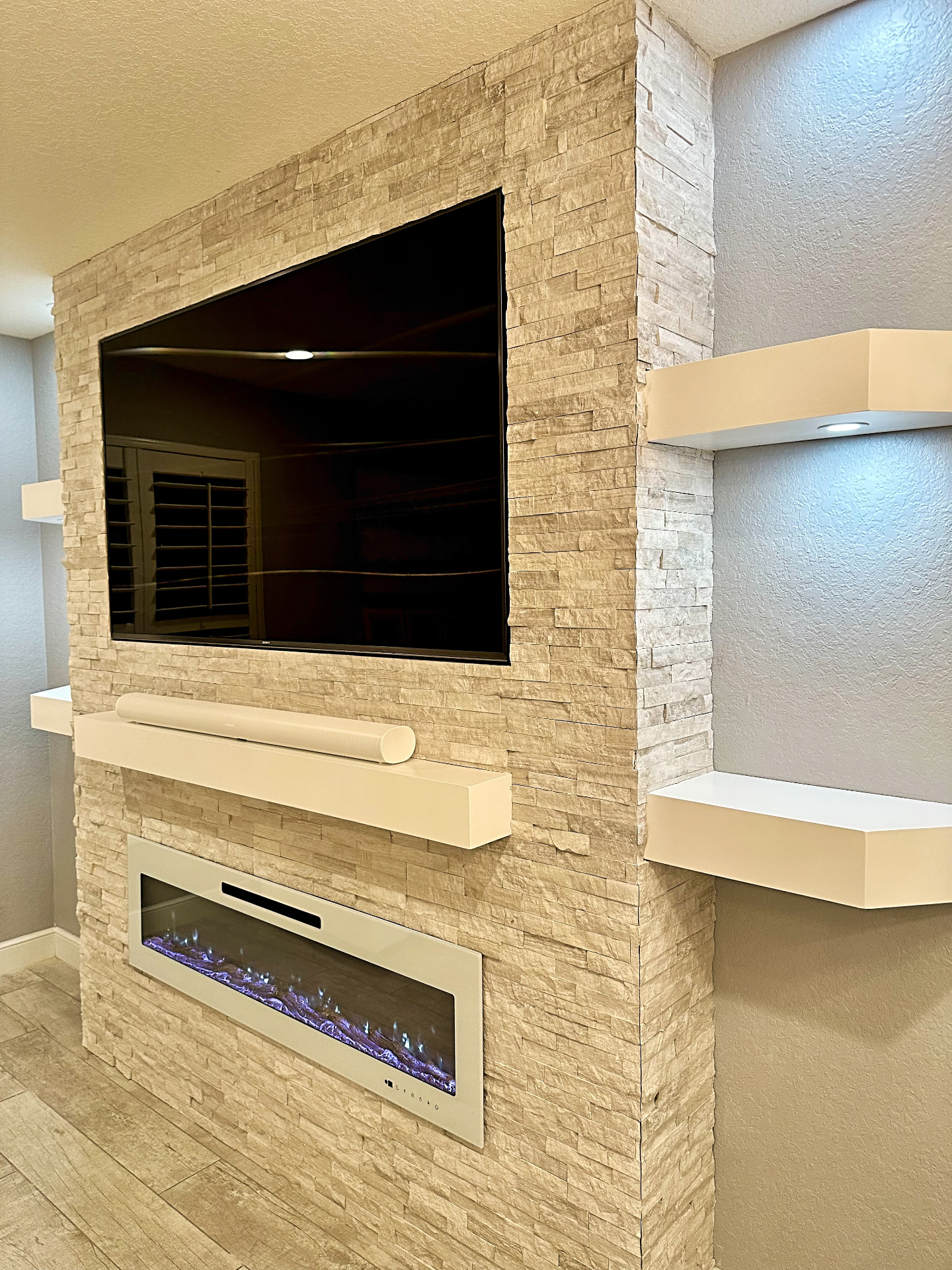 Custom Entertainment Wall – Fireplace, TV & Stacked Stone | Delray Beach, FL - Professional Home Improvement Project in South Florida