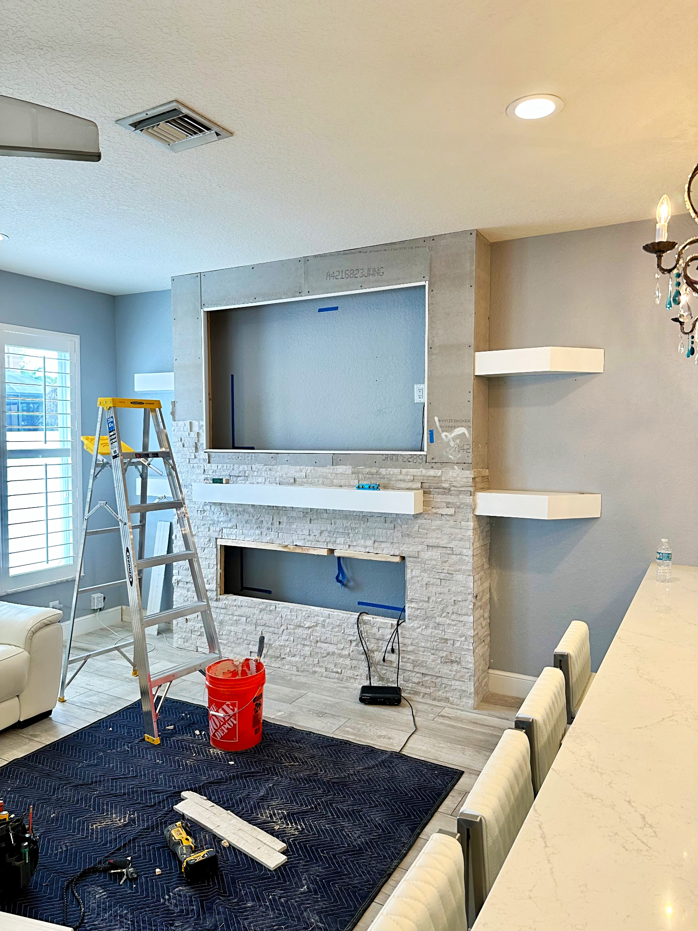 Custom Entertainment Wall – Fireplace, TV & Stacked Stone | Delray Beach, FL - Professional Home Improvement Project Image 2